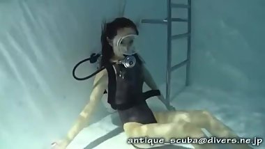 Asian Scuba Woman Into The Water
