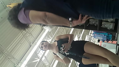 Cakey young Asian teasing in shorts.